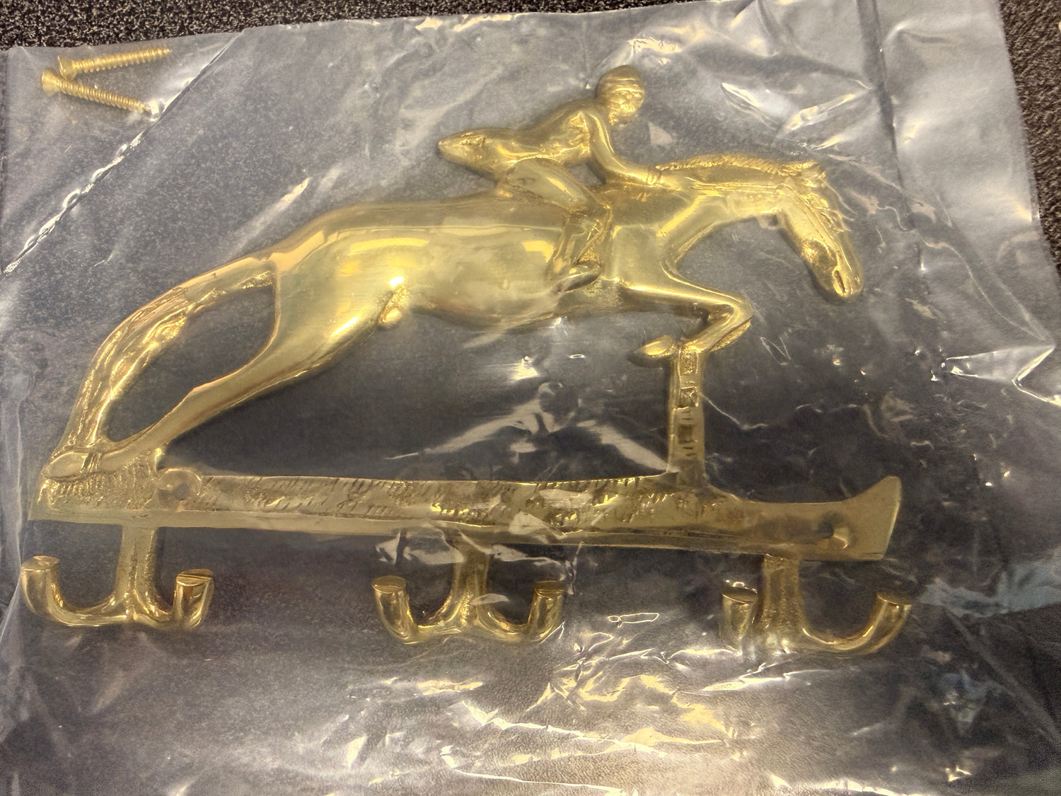 Jumping horse tack hooks brass
