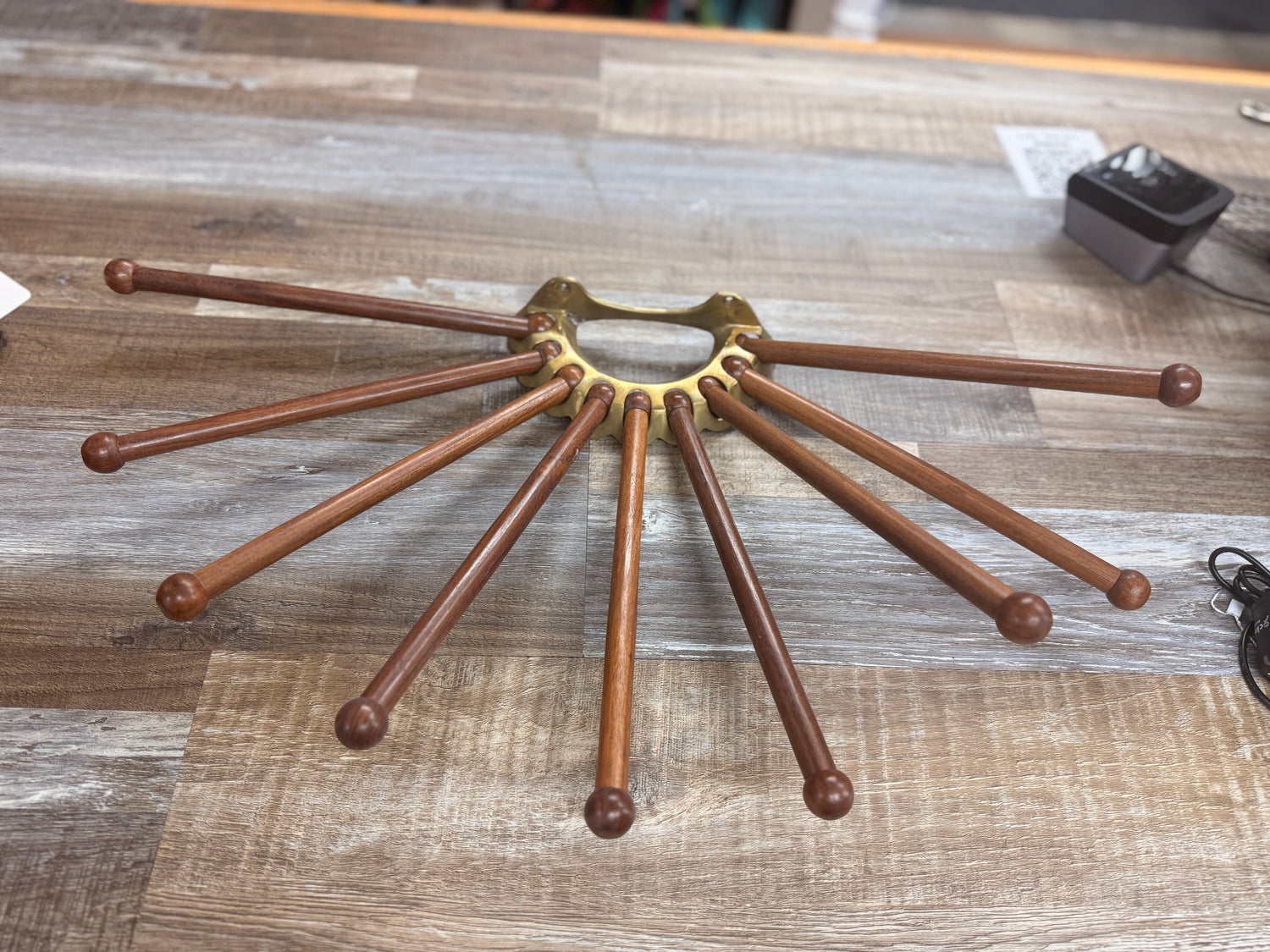 brass and wood dowel tack hanger for tack room