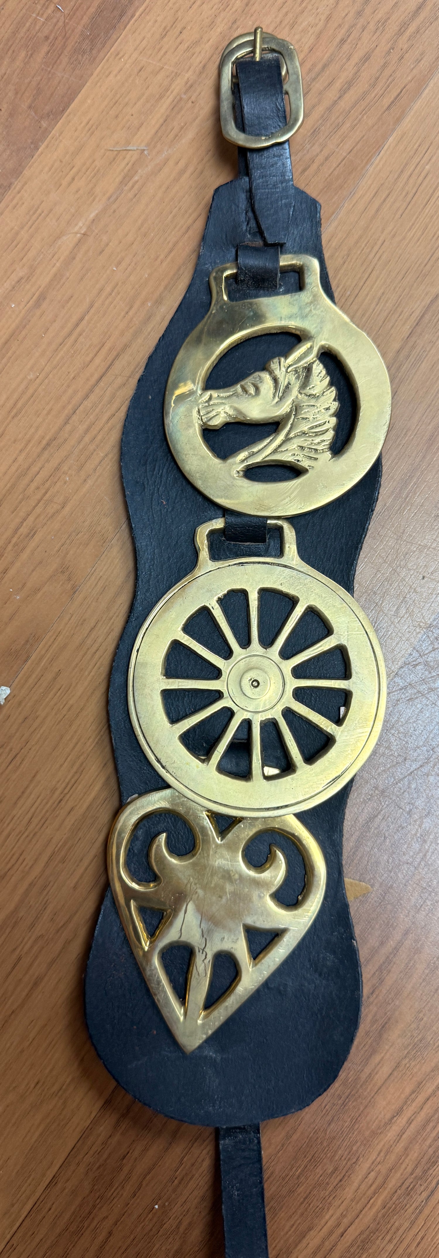 harness brass medallions on leather strip set of 3 medallions on leather strip