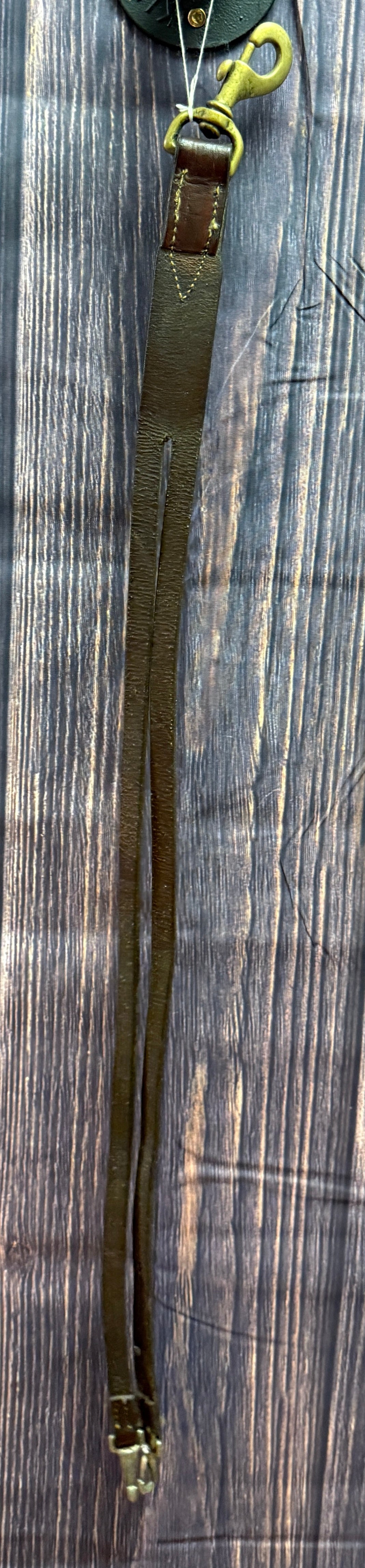 Martingale attachment with clips and snap.