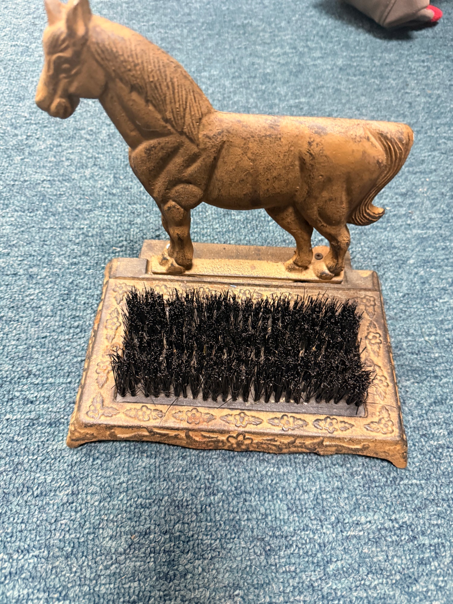 cast iron horse and boot brush