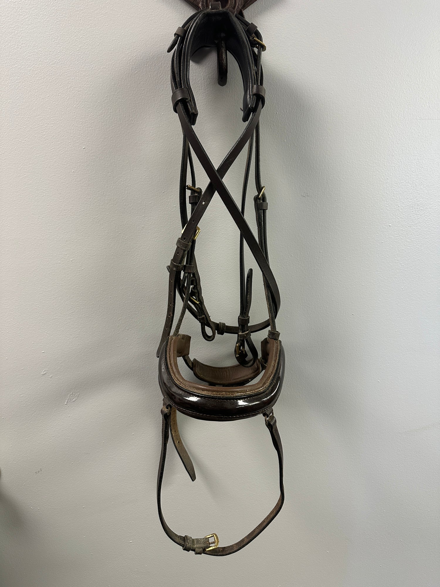 fancy patent leather Fancy Dressage Bridle that is Padded